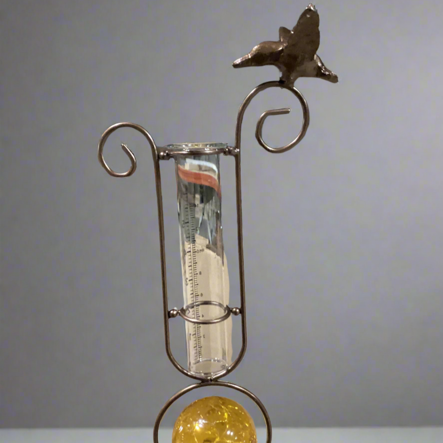 Rain Gauge with Orange Solar Ball and Bird