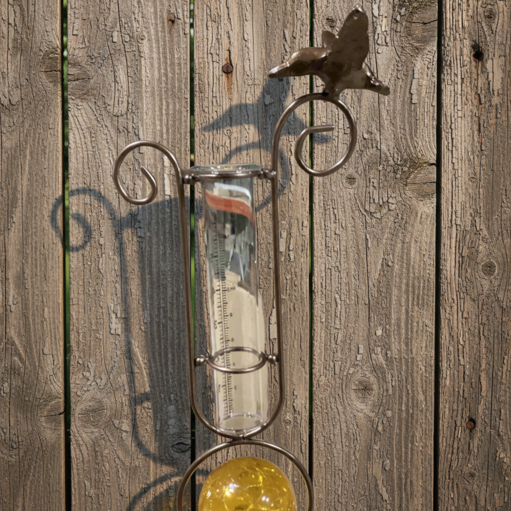 Rain Gauge with Orange Solar Ball and Bird