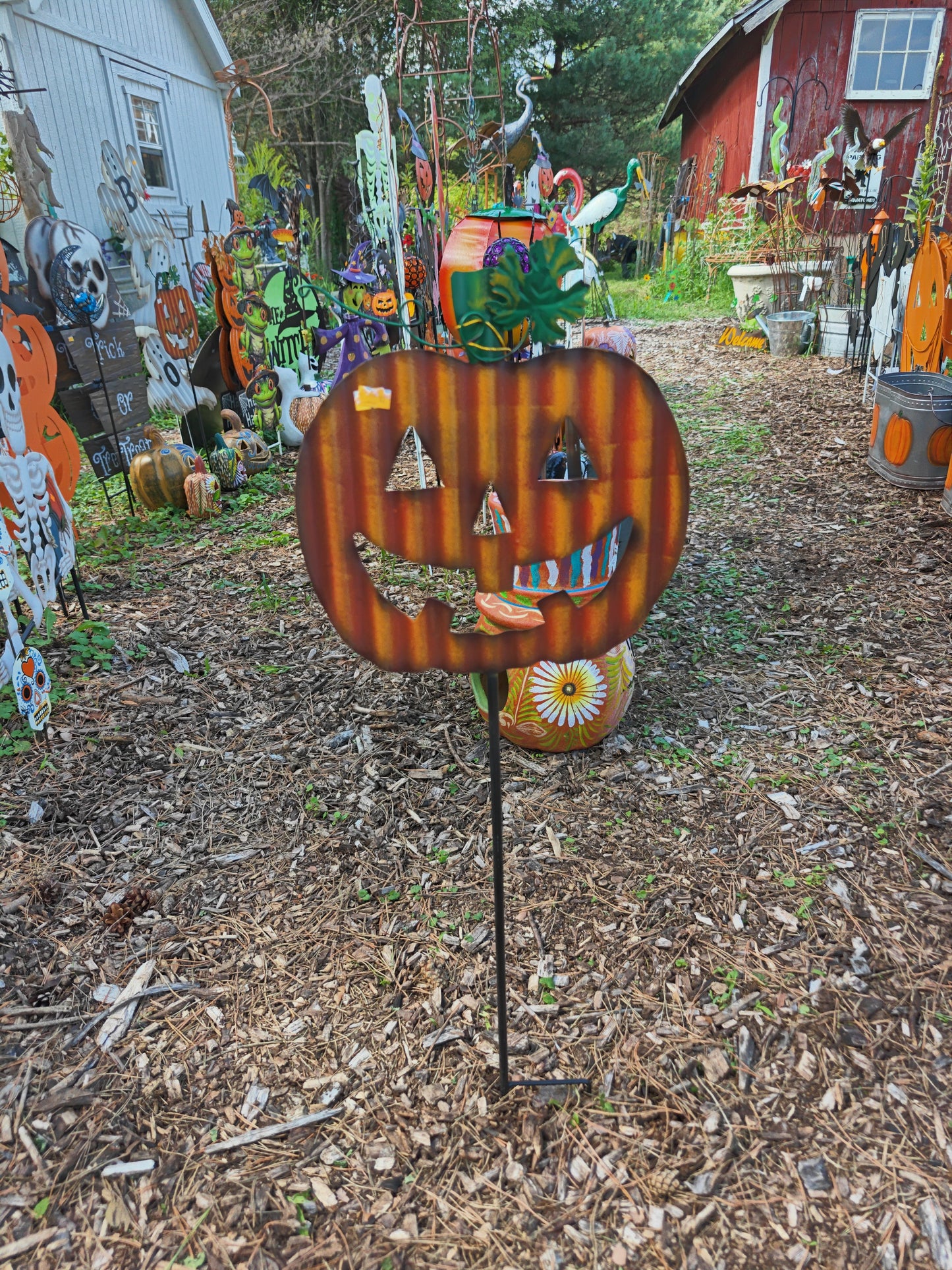 Currogated Pumpkin On Stake