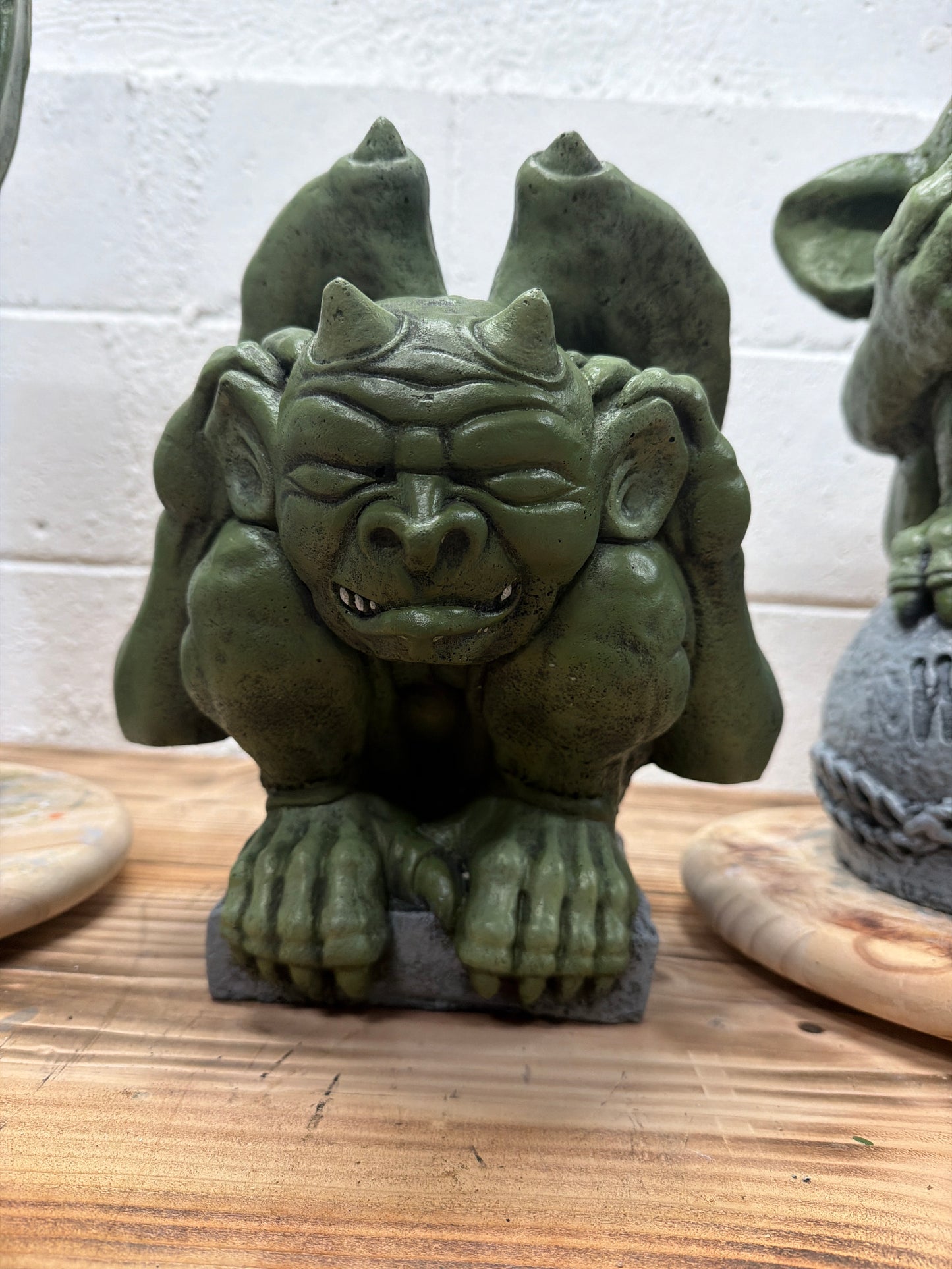 Gargoyle Hands on Ears