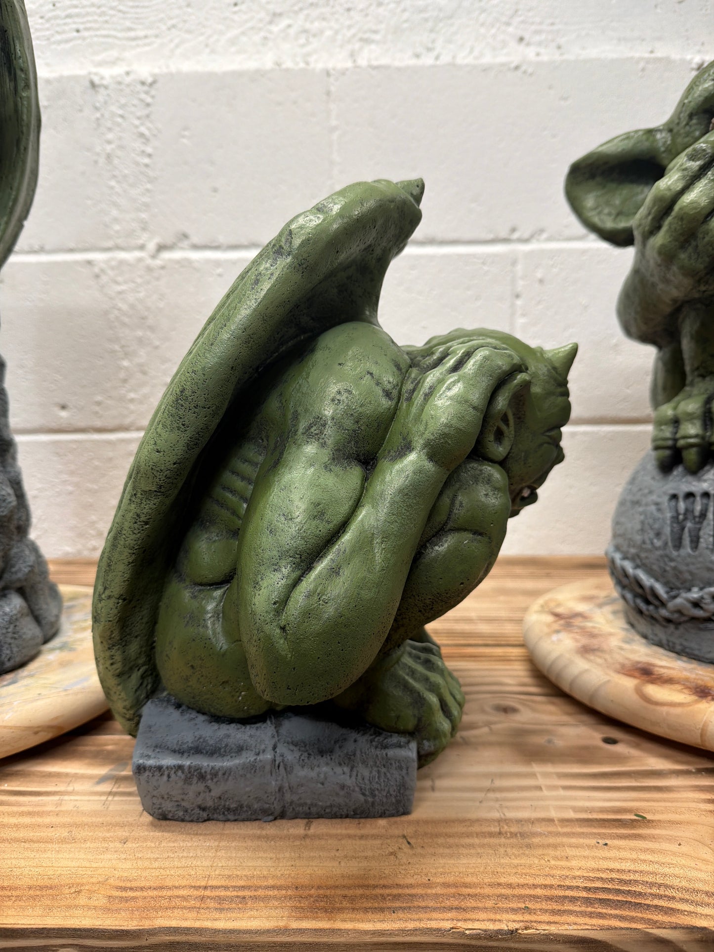 Gargoyle Hands on Ears
